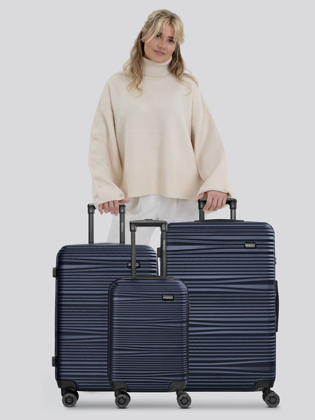 Redolz Essentials 16 3-SET 4 ruote Set di valigie 3 pezzi Redolz Essentials 16 3-SET 4 ruote Set di valigie 3 pezzi
