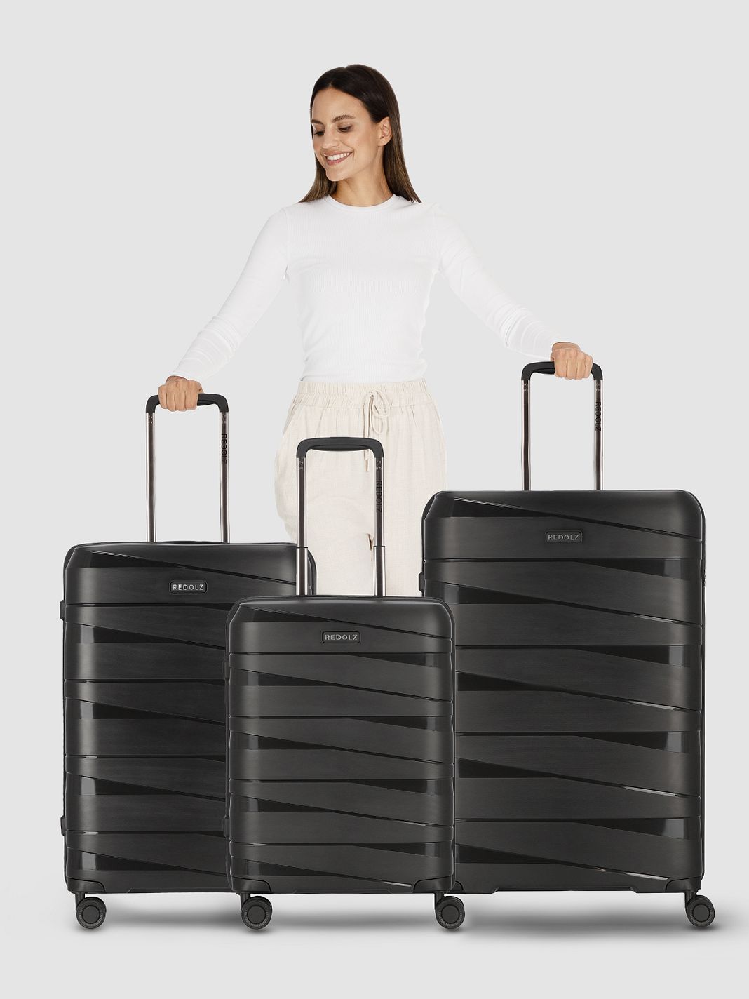 Redolz Essentials 10 3-SET 4 ruote Set di valigie 3 pezzi Redolz Essentials 10 3-SET 4 ruote Set di valigie 3 pezzi
